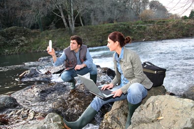 Biologists testing water of natural river